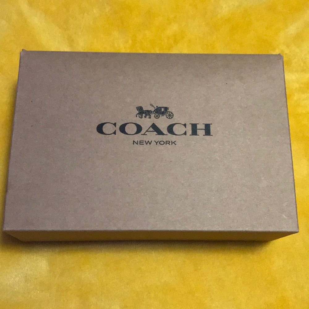 NWT Coach silver stud earrings